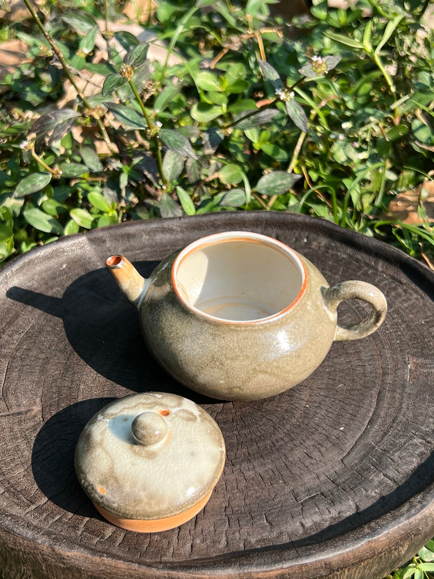 this is a ceramic teapot