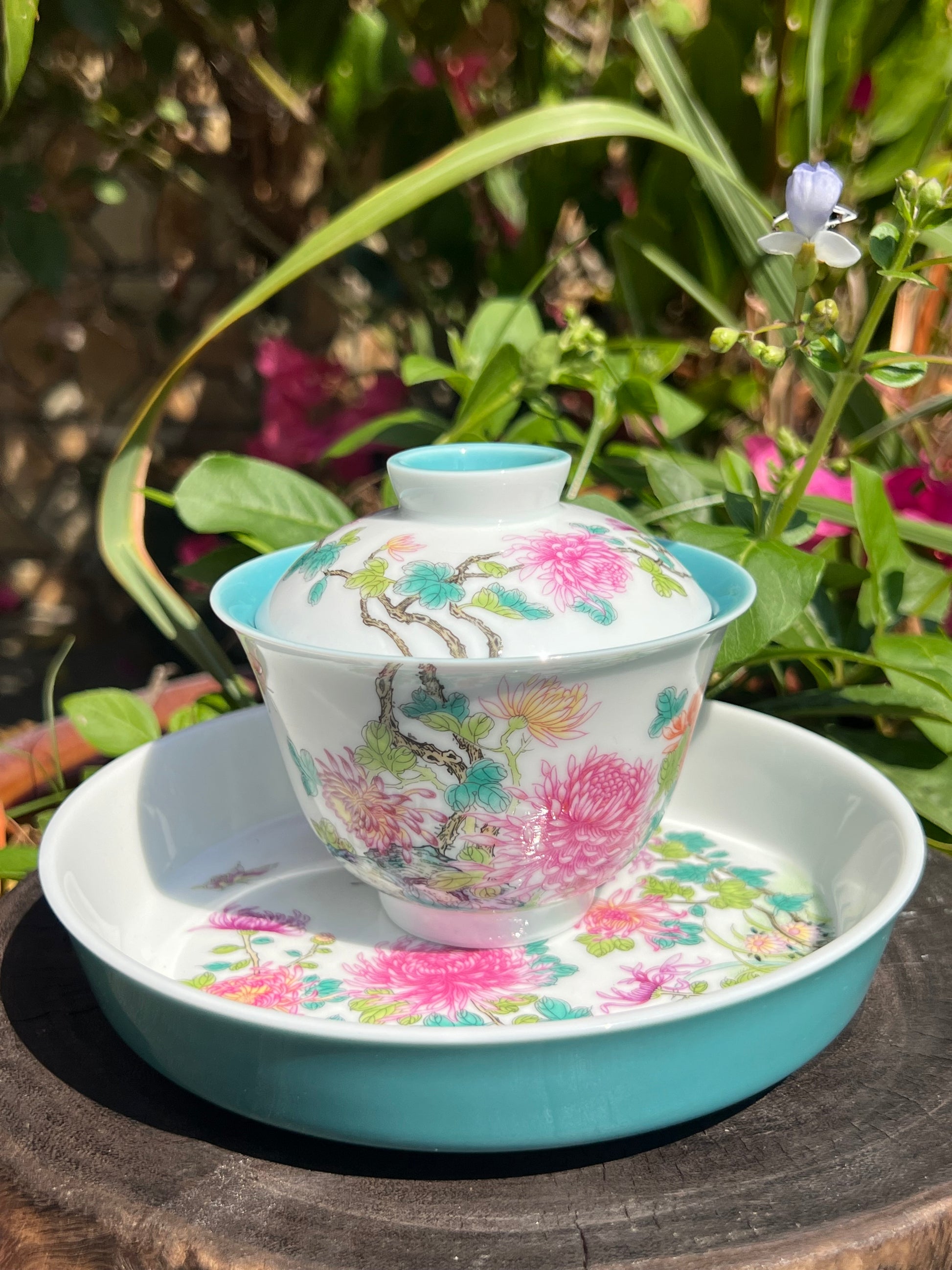 This is a Chinese Jingdezhen enamel chrysanthemum flower teapot gaiwan