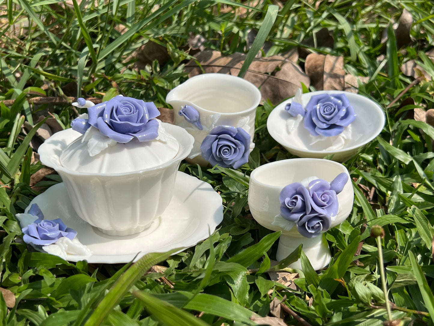 this is a woodfired white fine pottery flower teacup