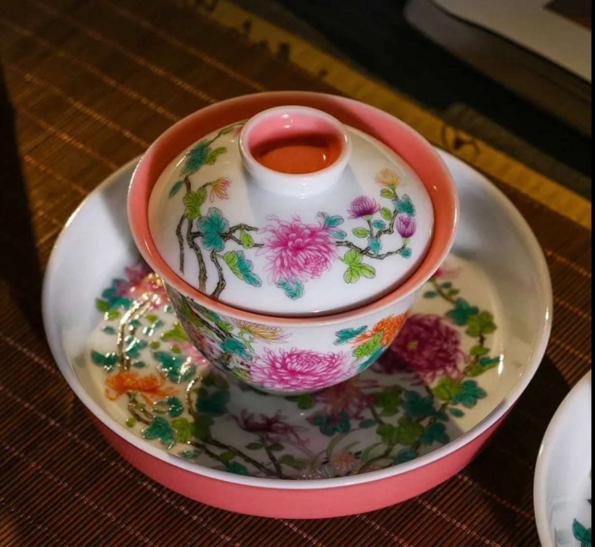 This is a Chinese Jingdezhen enamel chrysanthemum flower teapot gaiwan