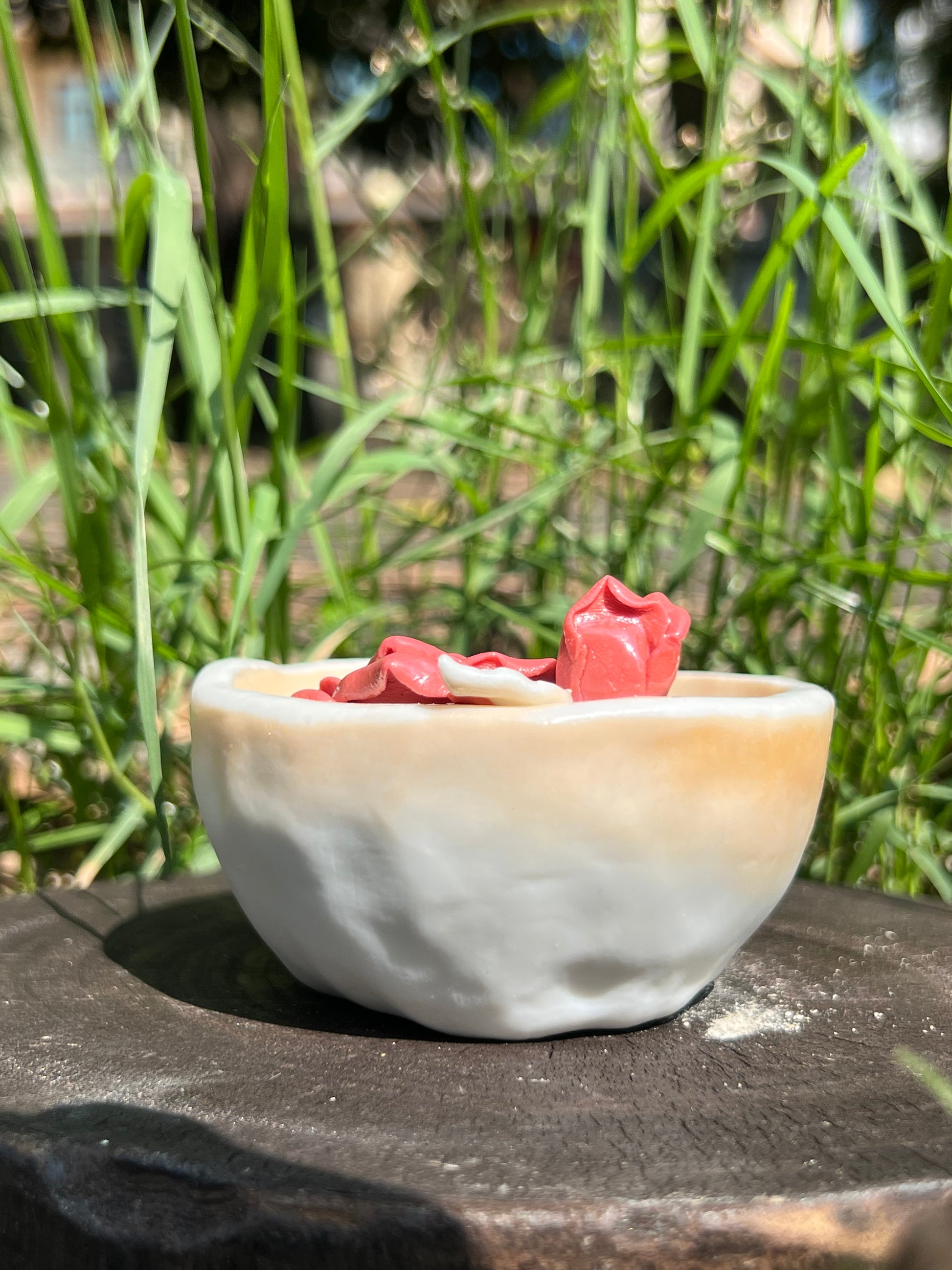 This is a woodfired pottery flower teacup