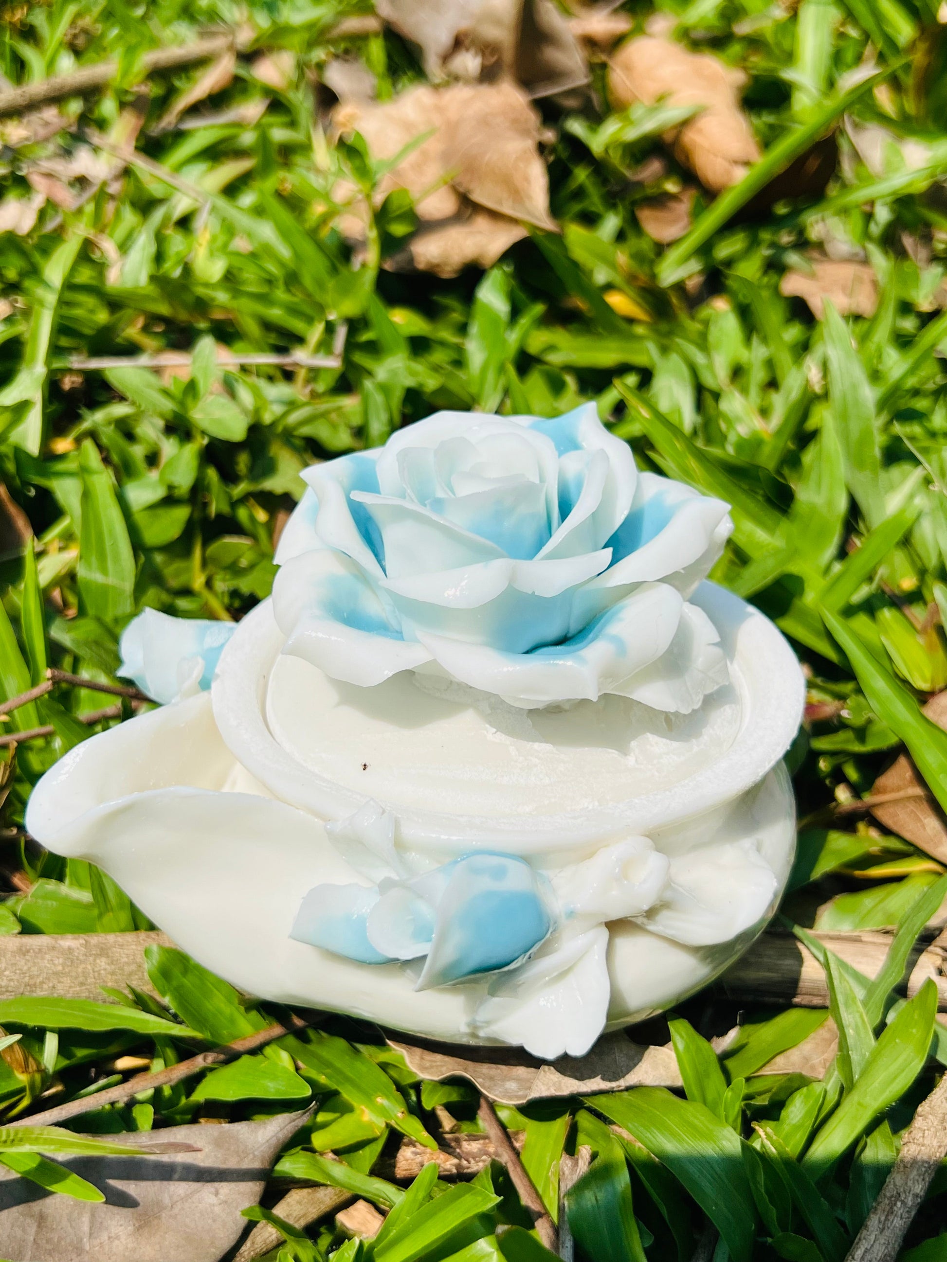 this is a woodfired white fine pottery flower teacup