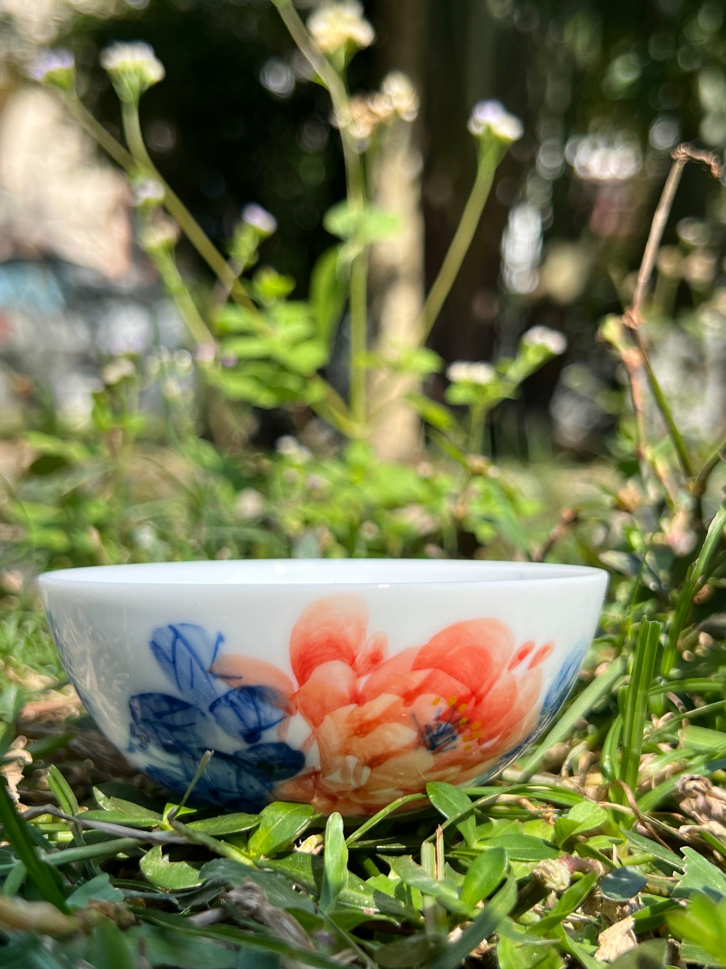 This is a Chinese Jingdezhen blue and white porcelain peony flower teacup