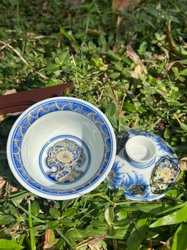 This is a Chinese Jingdezhen blue and white porcelain dragon teapot gaiwan