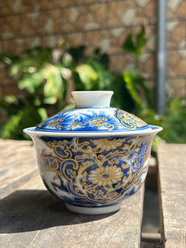 This is a Chinese Jingdezhen blue and white porcelain dragon teapot gaiwan