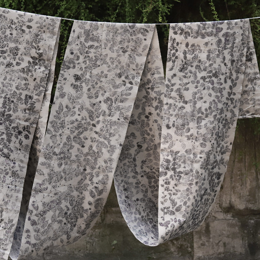 This is a plant-dyed tea mat table cloth