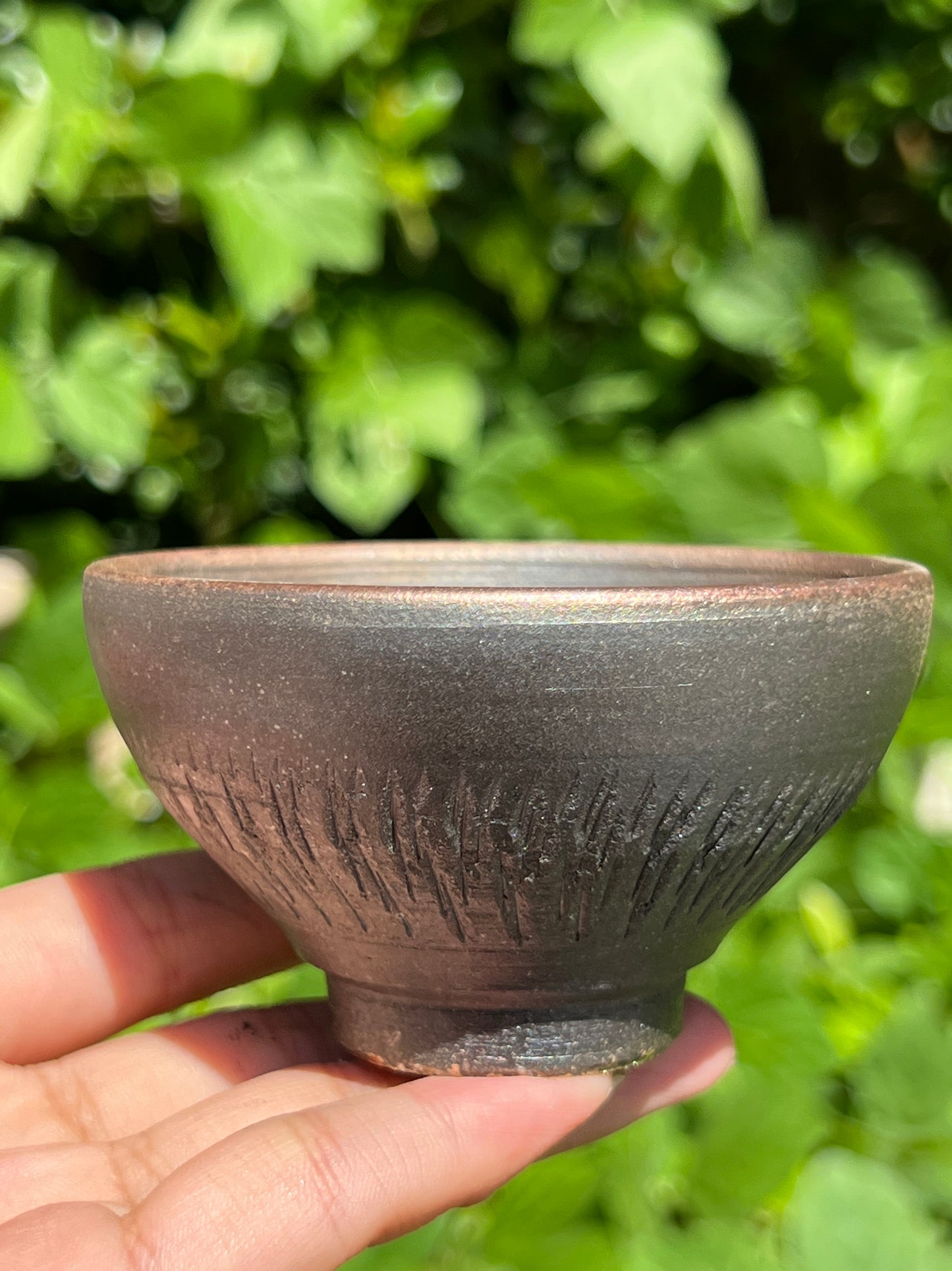 This is a woodfired tietai pottery teacup