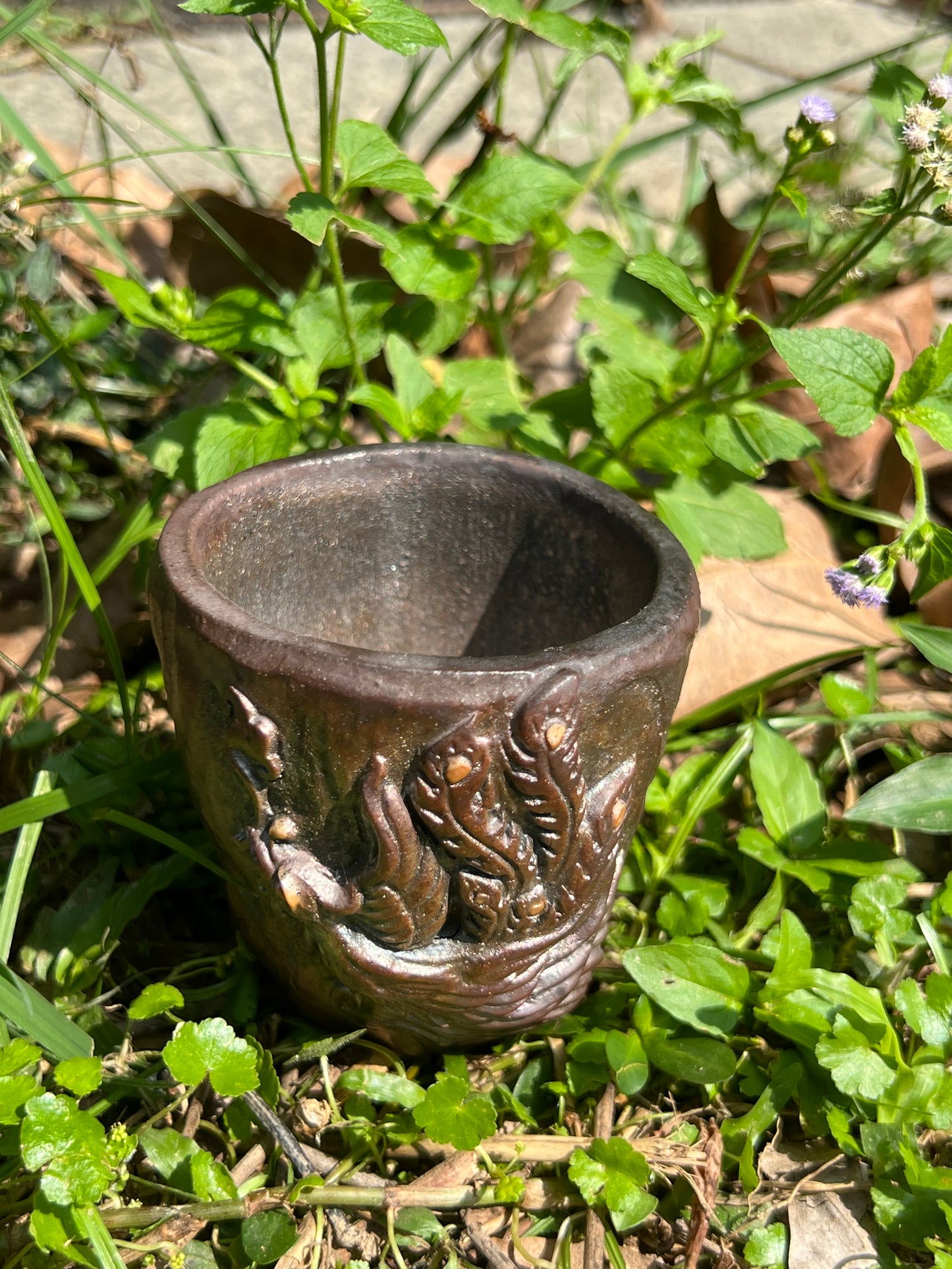 This is a woodfired tietai pottery phoenix  teacup