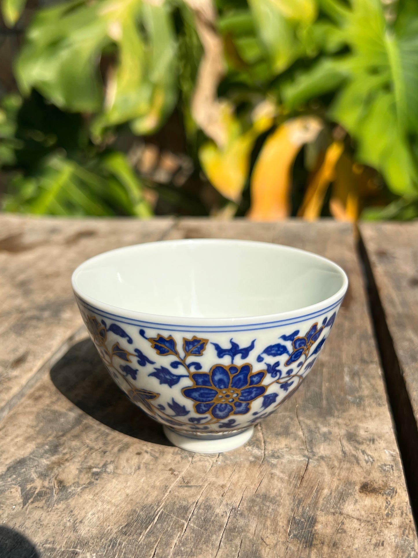 This is a Chinese Jingdezhen blue and white porcelain flower teapot gaiwan