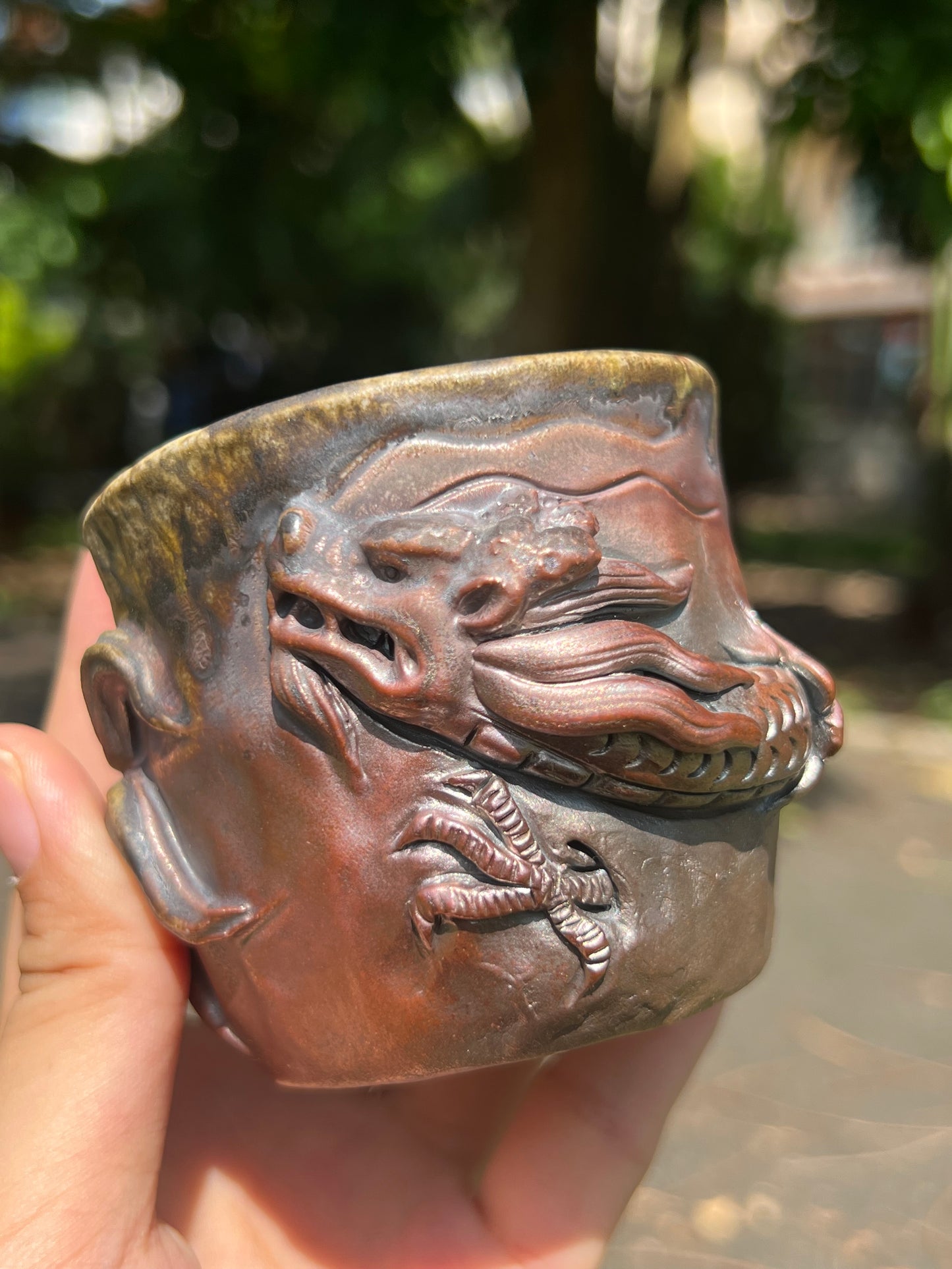 This is a woodfired tietai pottery dragon teacup