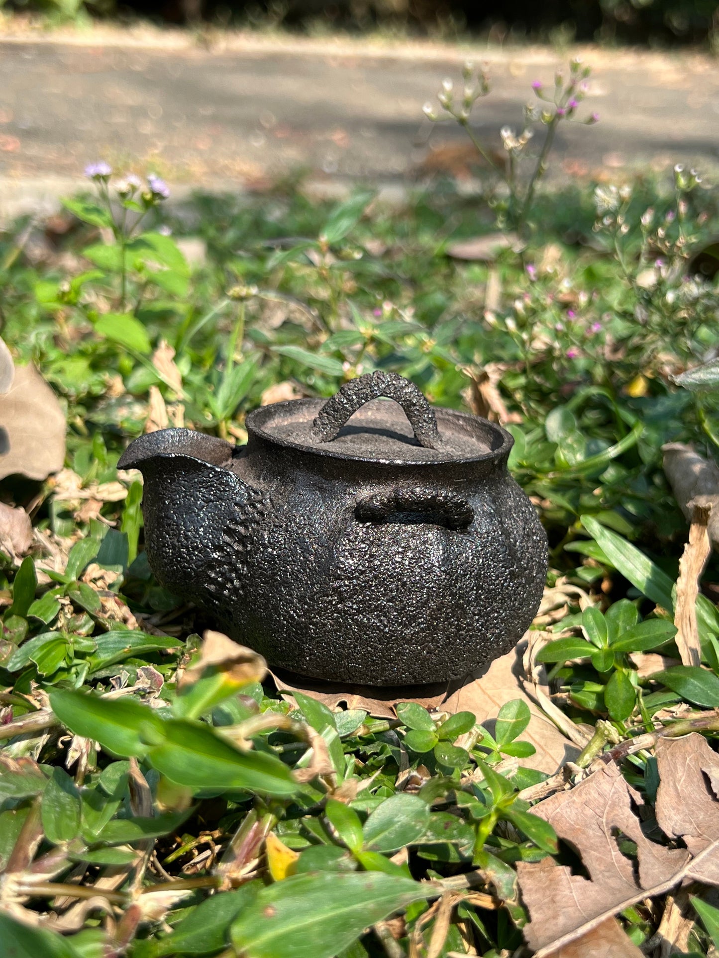 This is a purple clay teapot