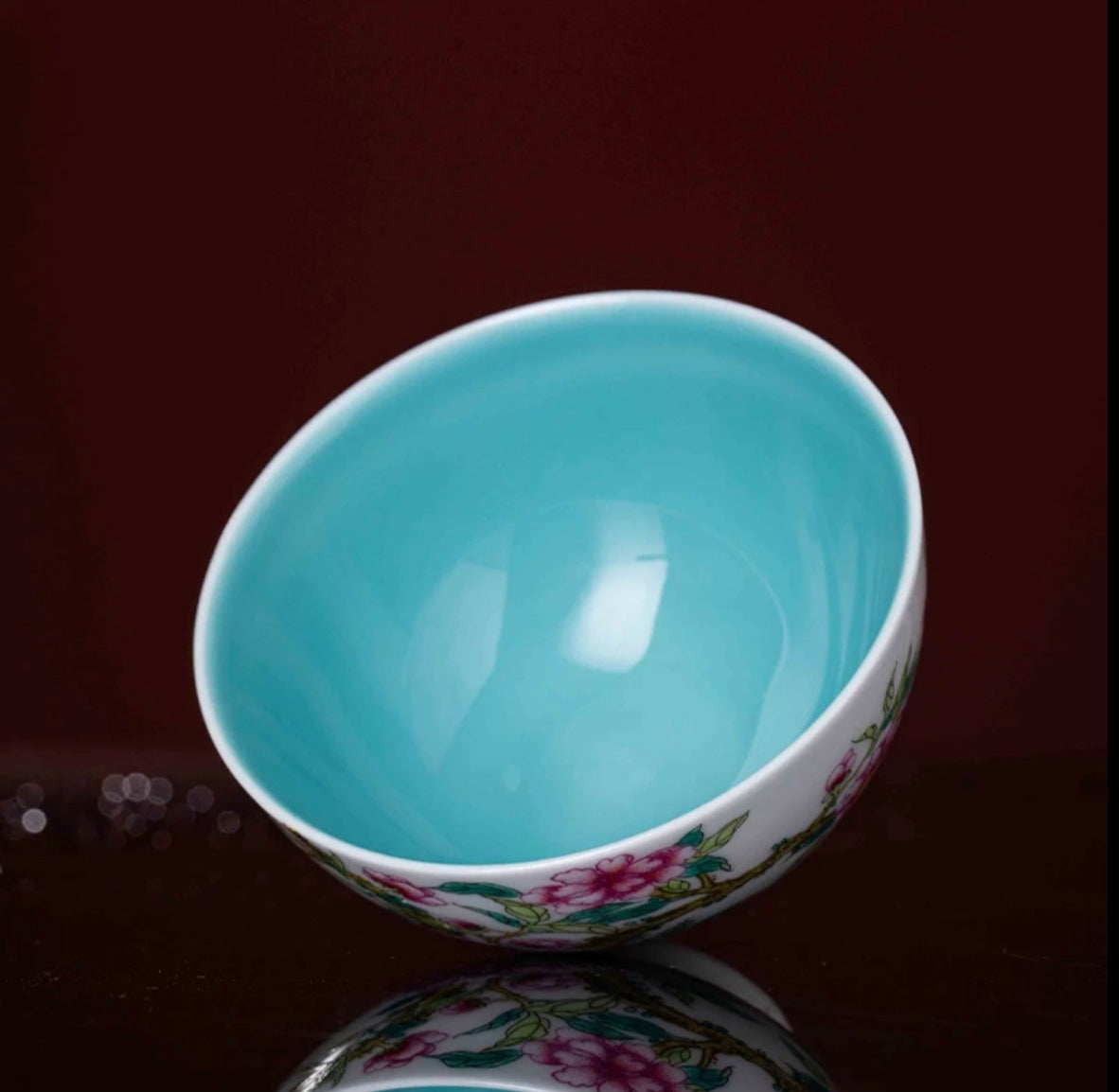 This is a Chinese Jingdezhen enamel flower teacup