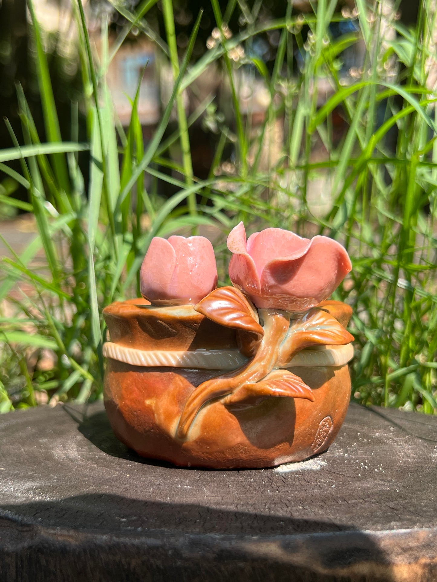 This is a woodfired pottery flower teacup