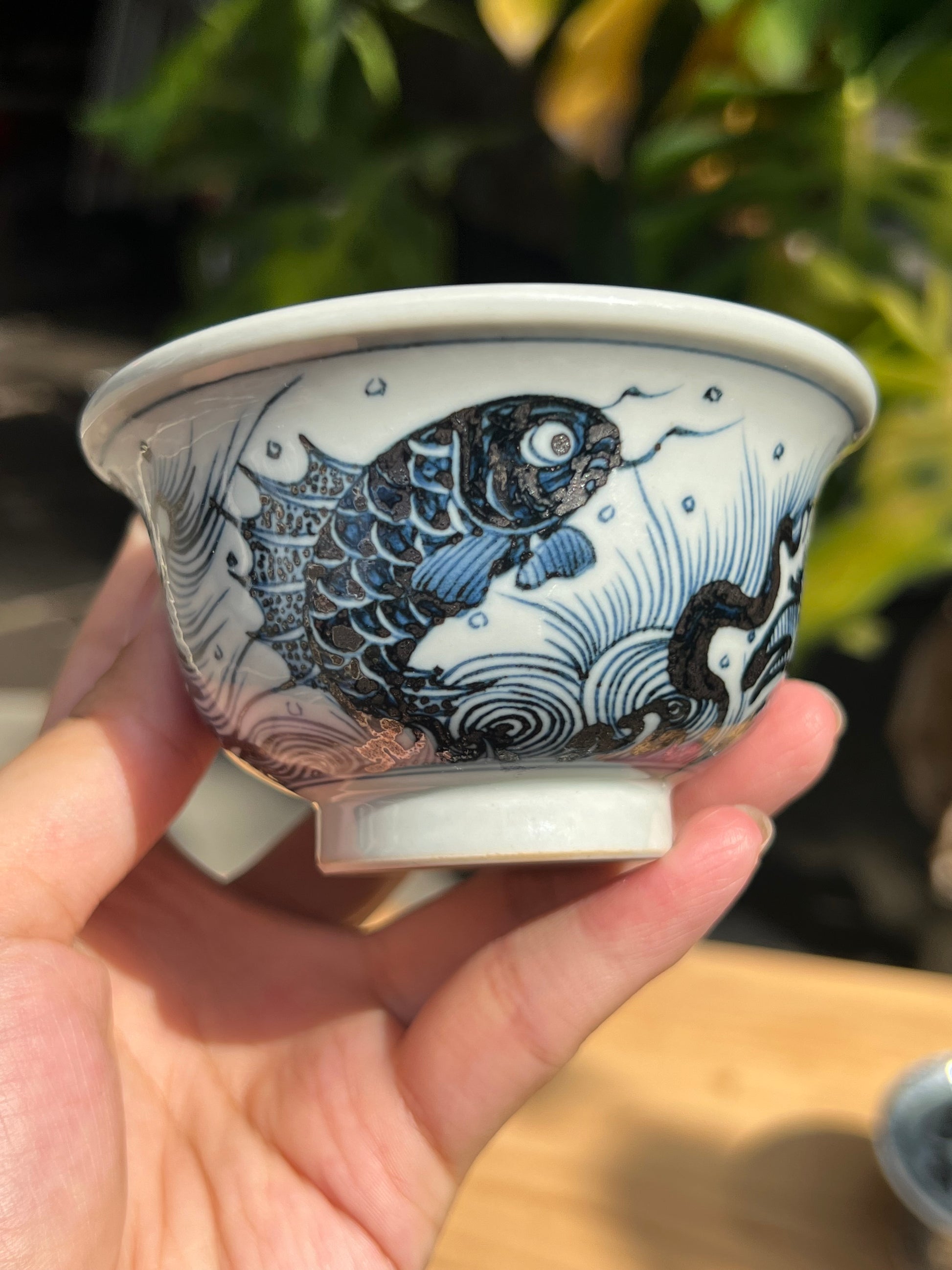 This is a Chinese Jingdezhen blue and white porcelain dragon teapot gaiwan