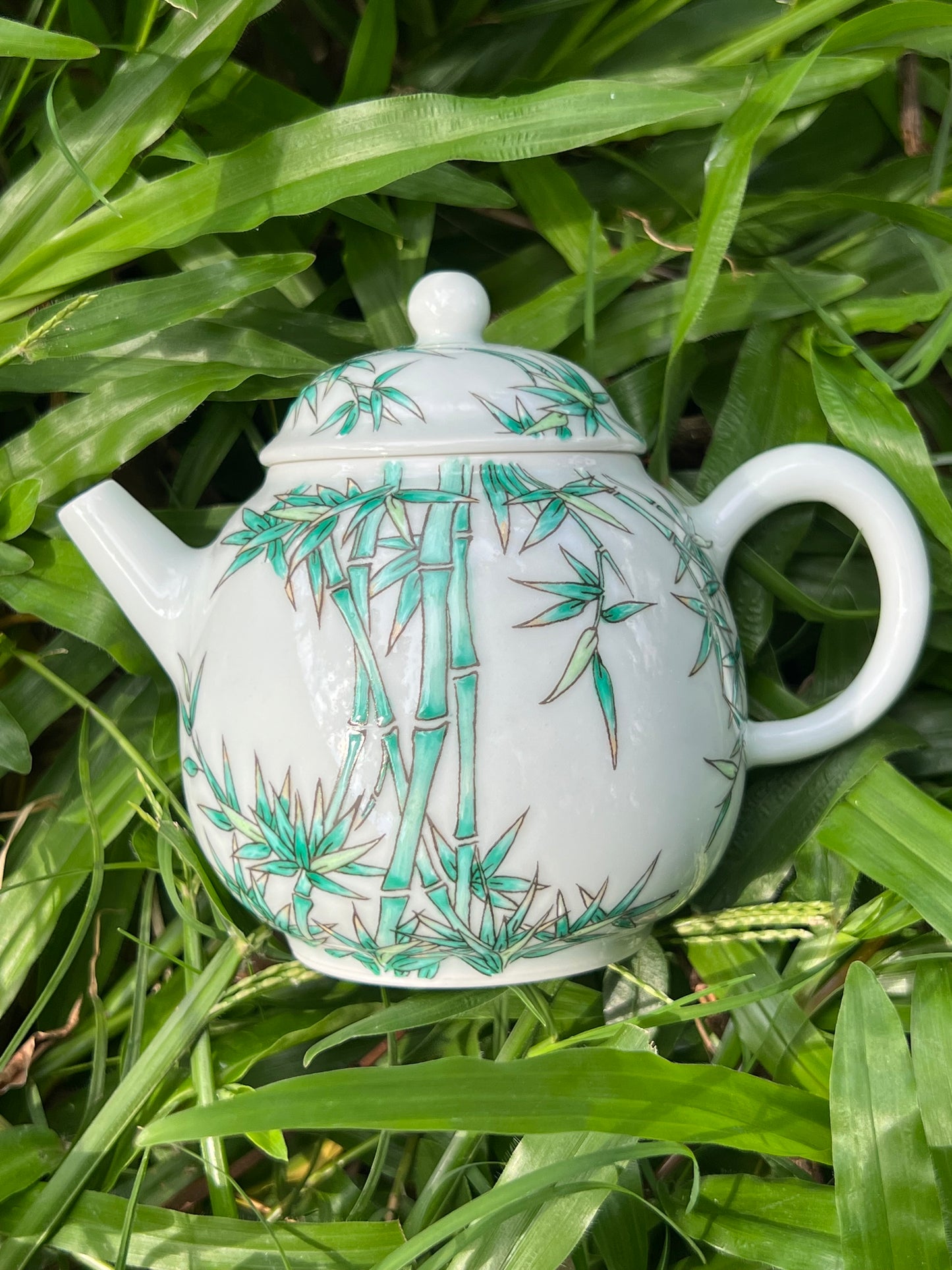 this is Chinese Jingdezhen famille rose ceramic teapot. this is a ceramic bamboo teapot