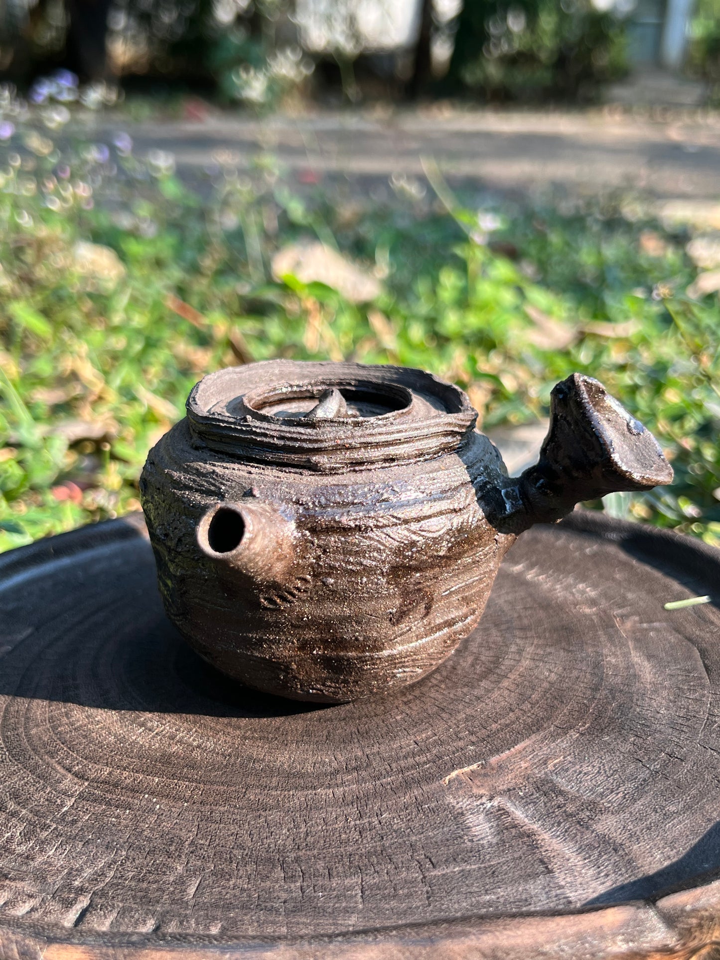 This is a purple clay teapot