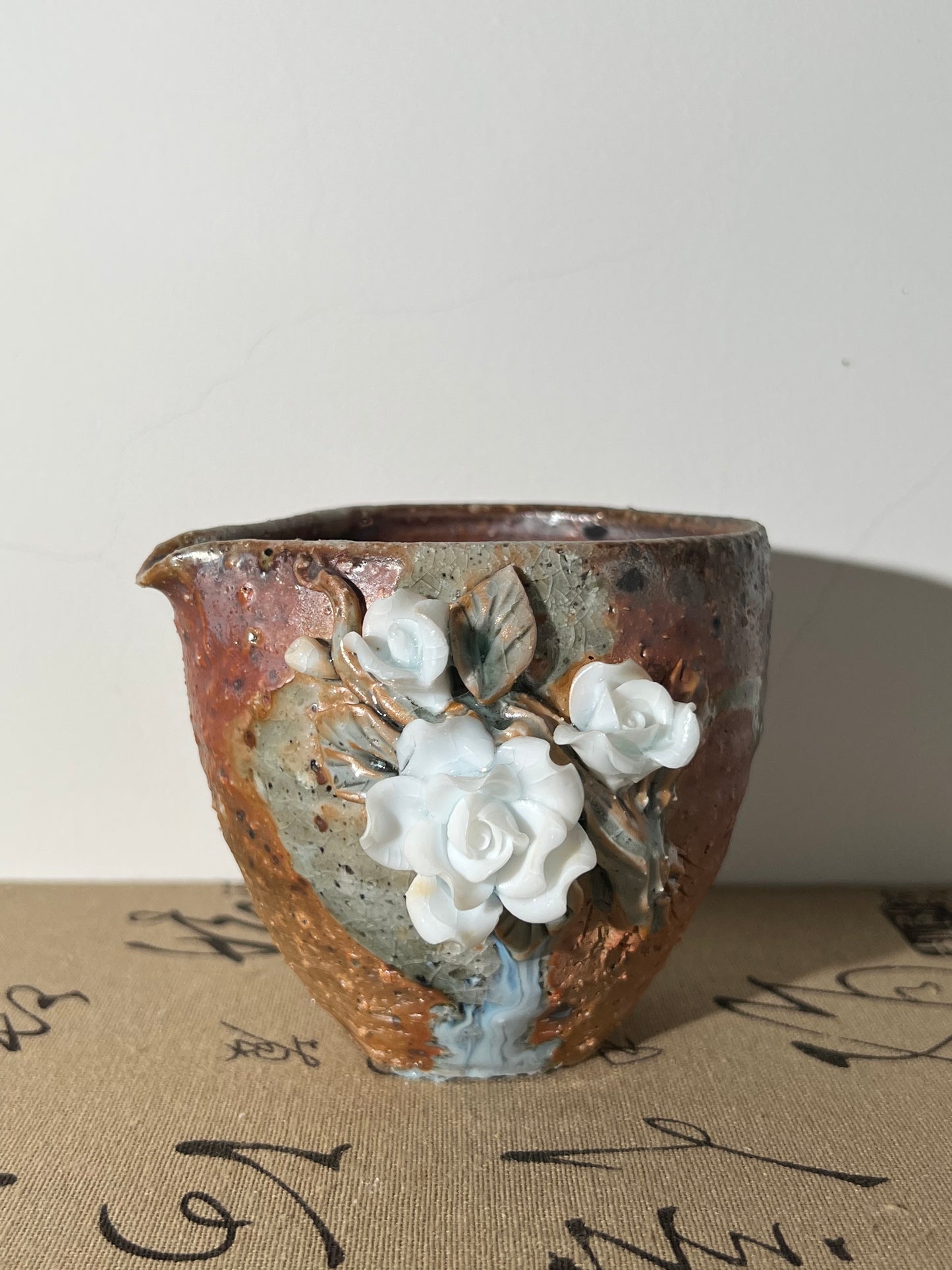 This is a woodfired pottery flower faircup gongdaobei