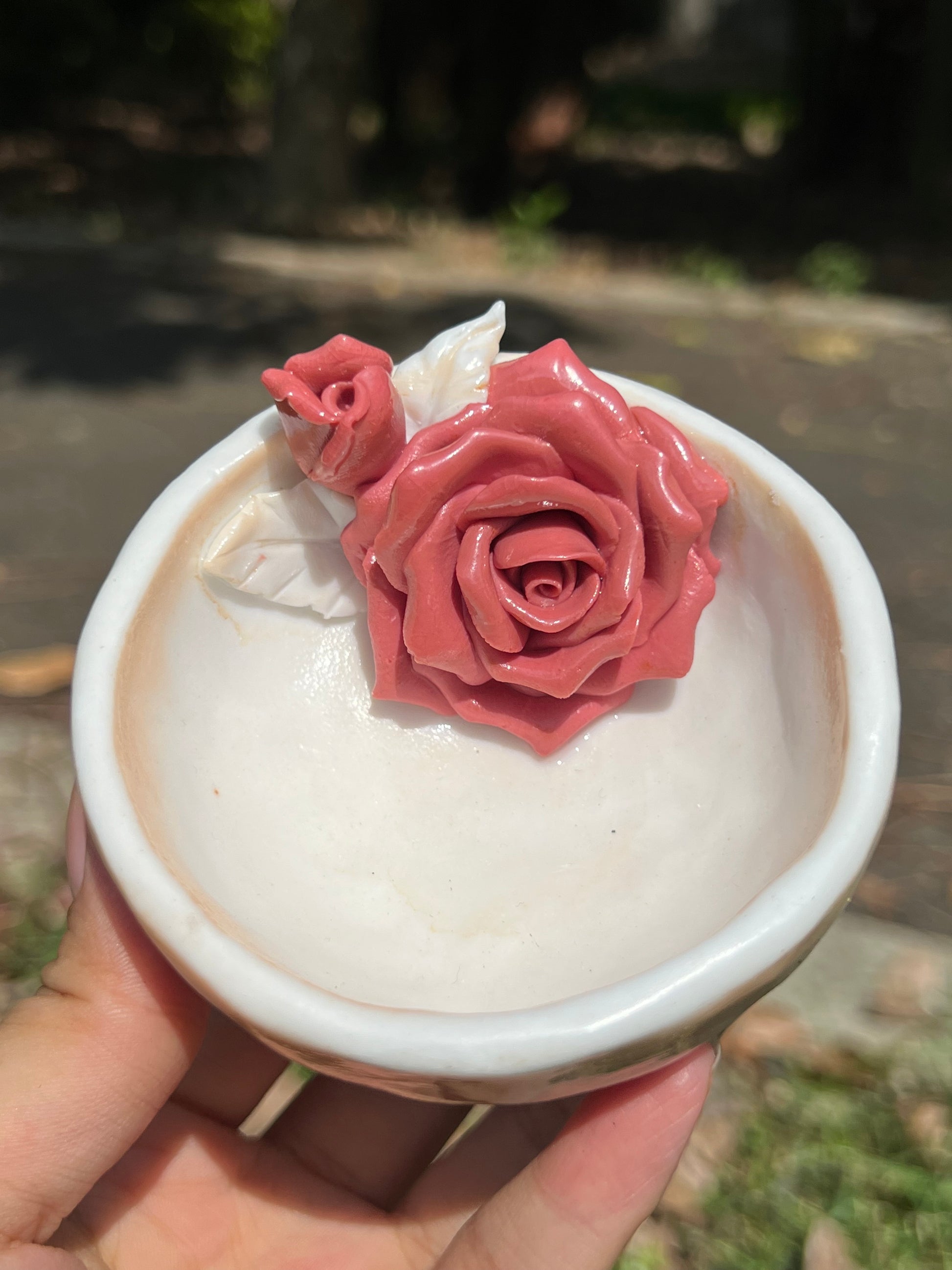 This is a woodfired pottery flower teacup