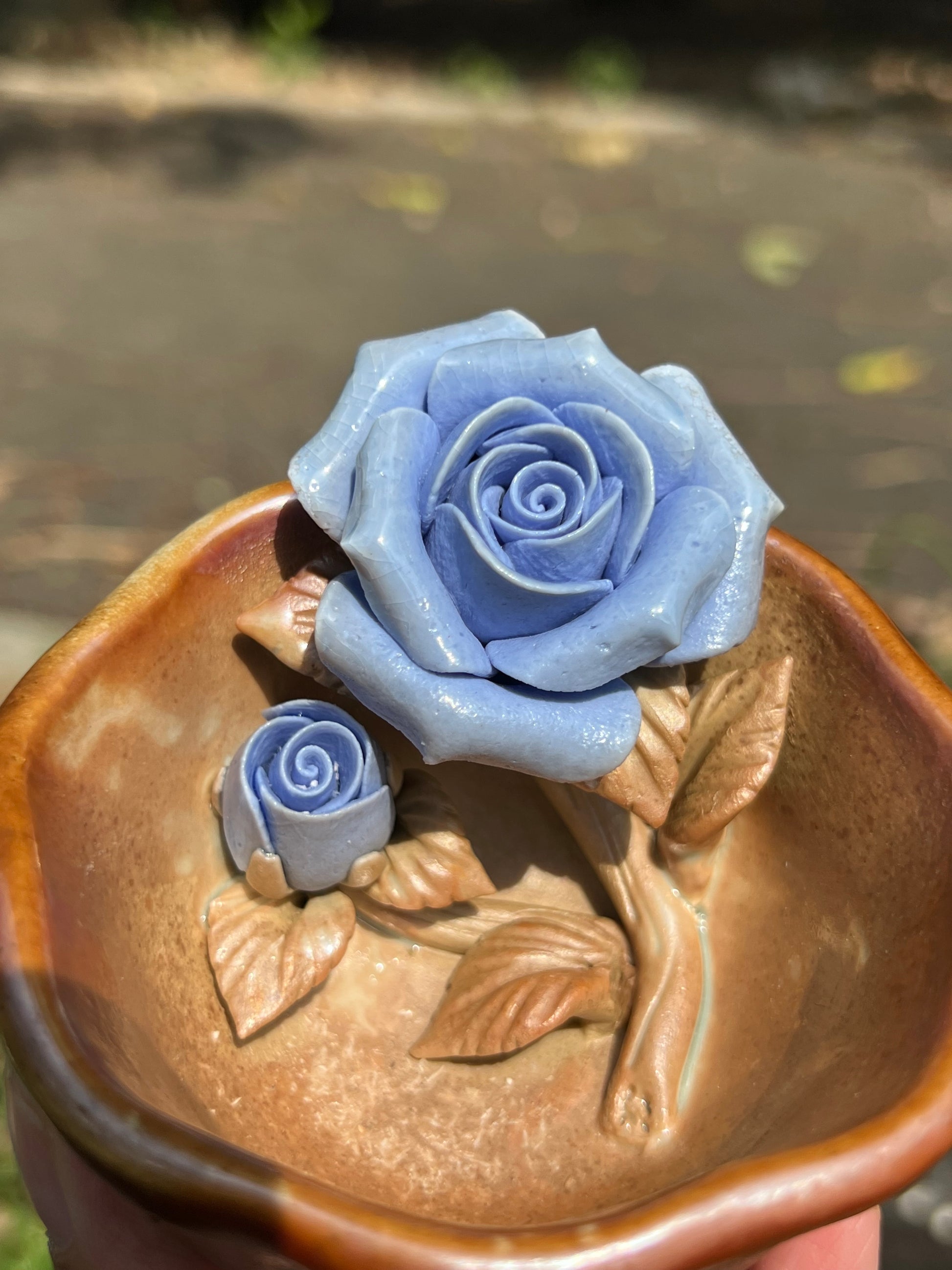 This is a woodfired pottery flower teacup