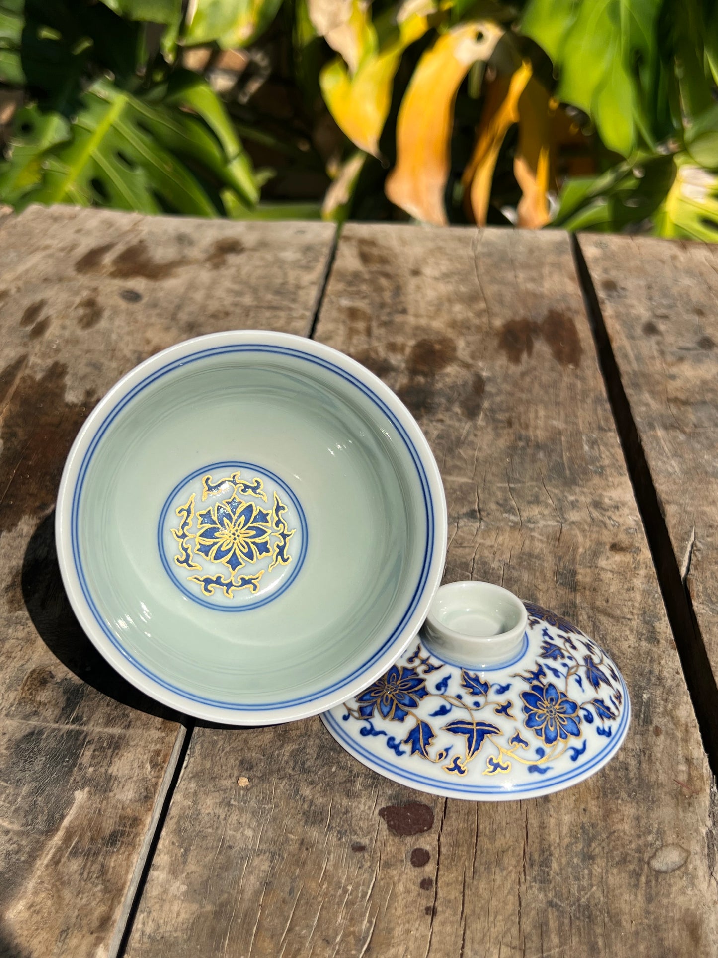 This is a Chinese Jingdezhen blue and white porcelain flower teapot gaiwan