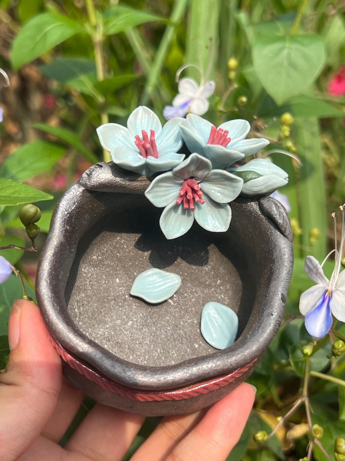 This is a woodfired tietai pottery flower teacup