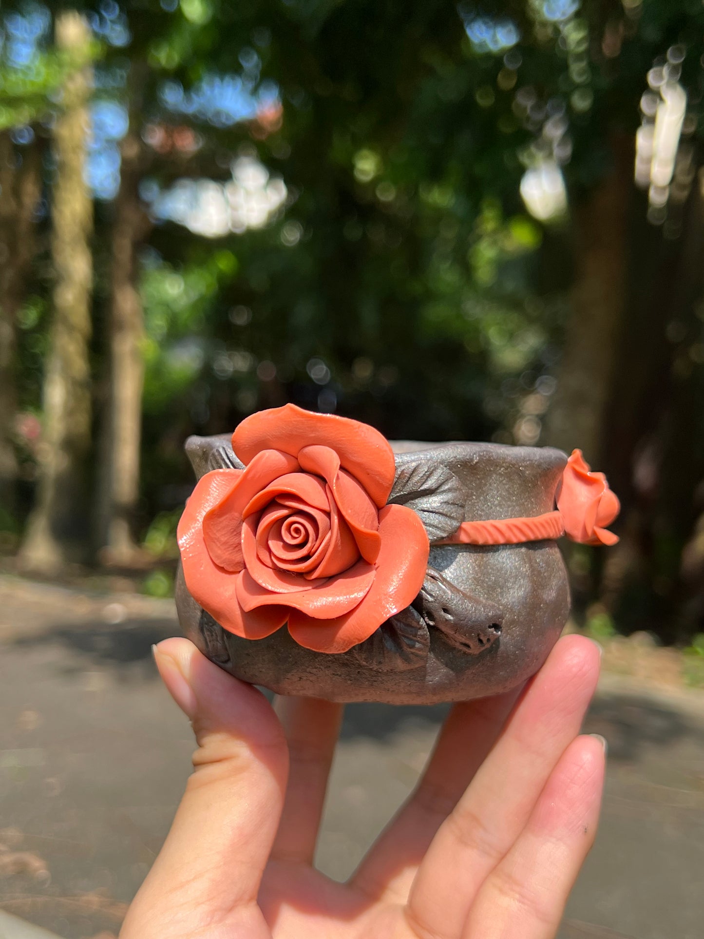 This is a woodfired tietai pottery flower teacup