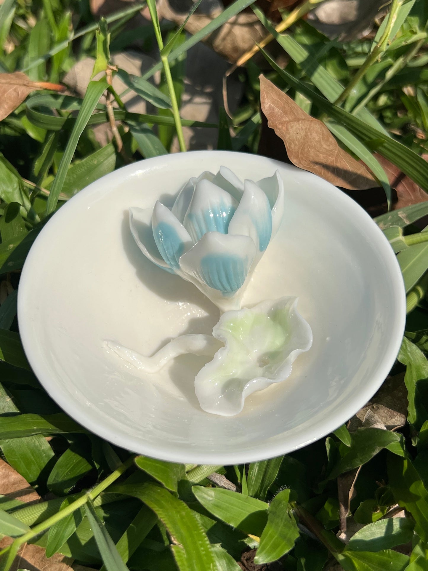 This is a woodfired white pottery flower faircup gongdaobei