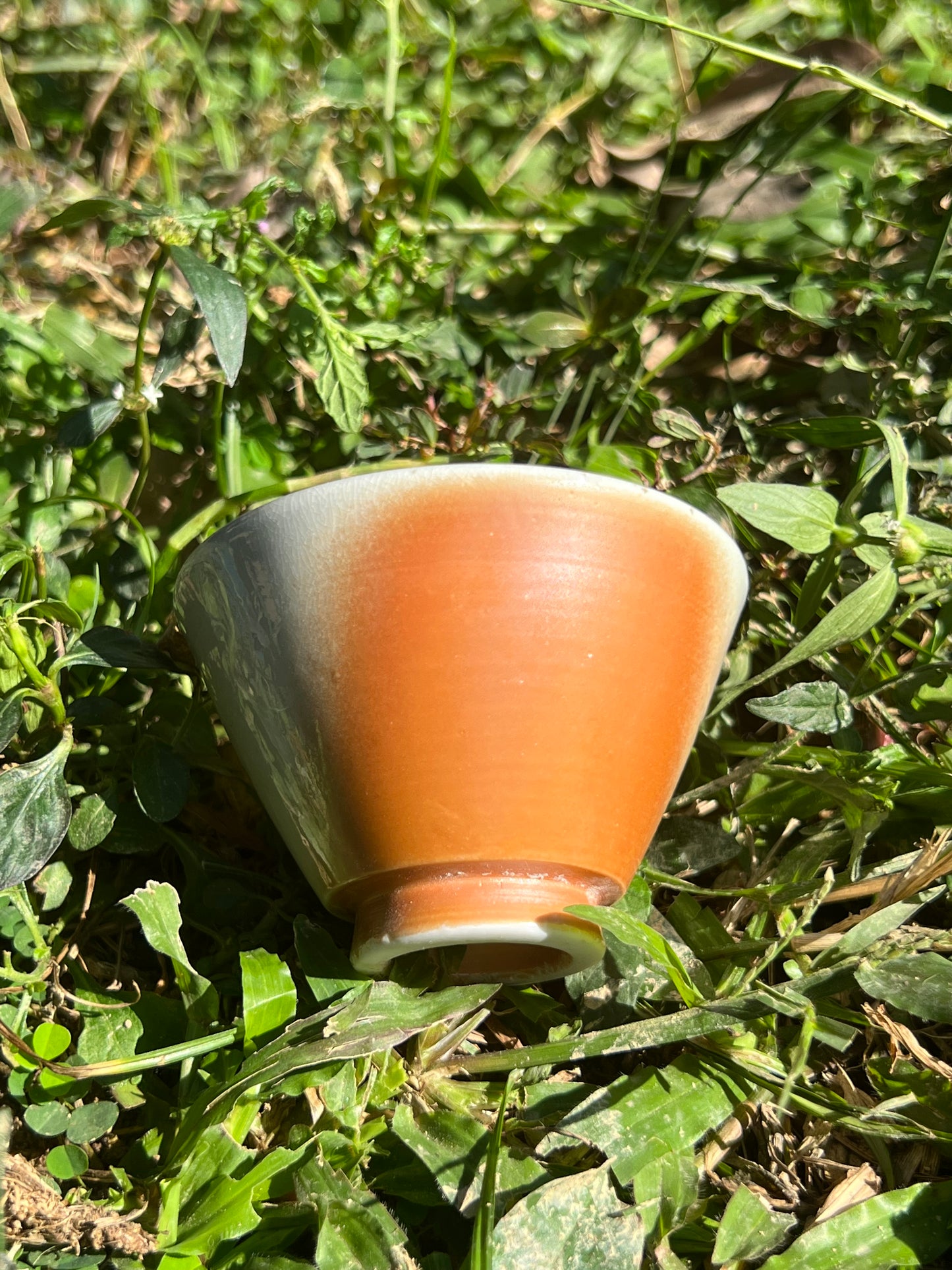 This is a woodfired pottery flower teacup