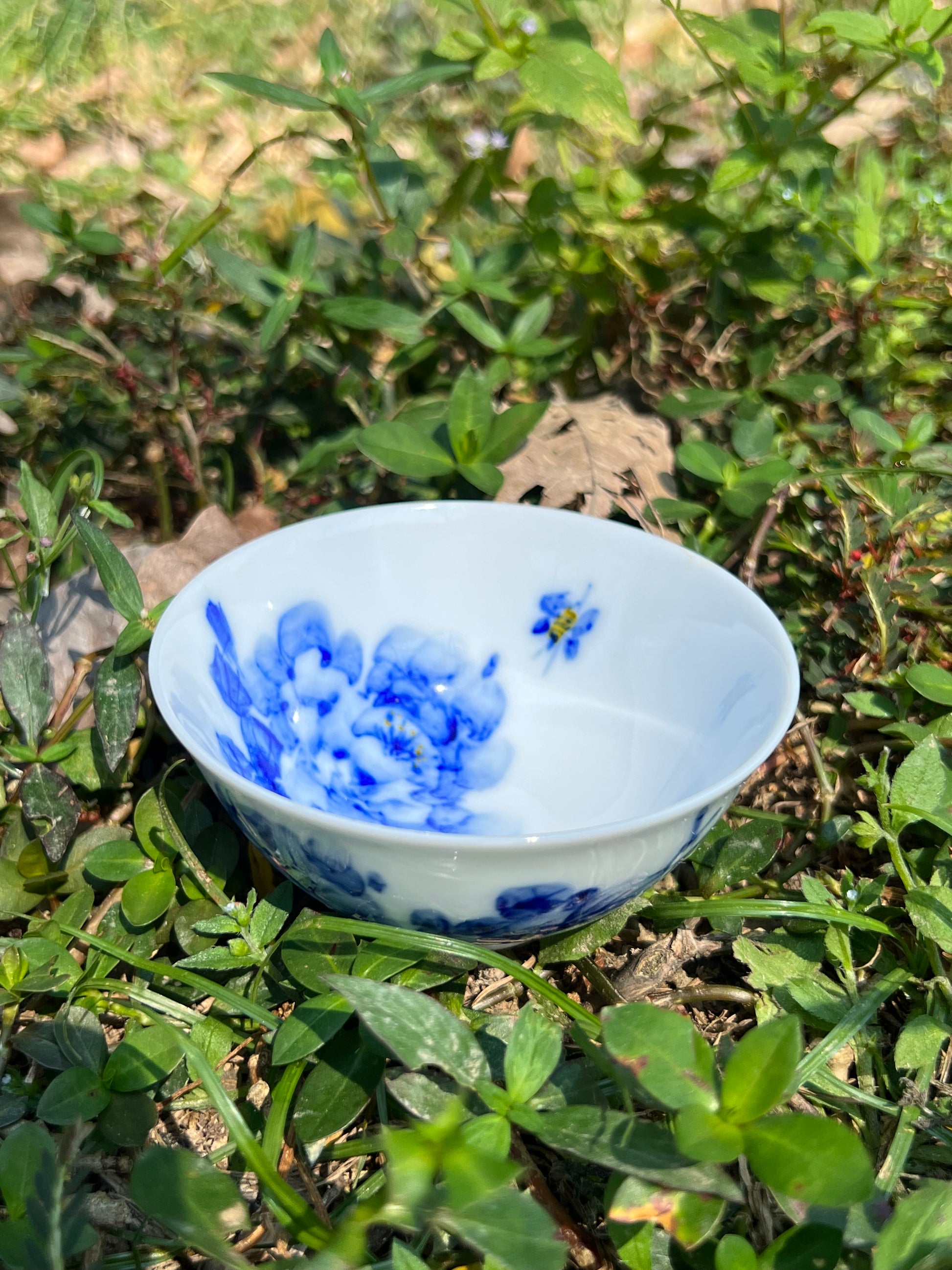 This is a Chinese Jingdezhen blue and white porcelain landscape teacup