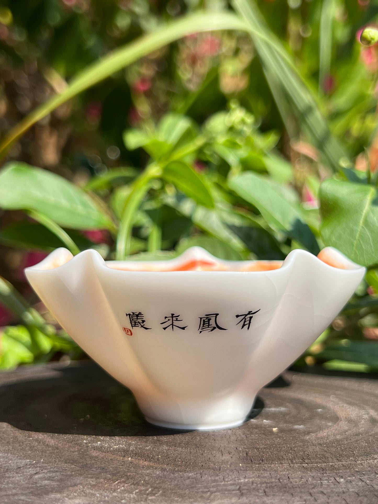 this is a Chinese Jingdezhen alum red phoenix teacup.this is a ceramic teacup