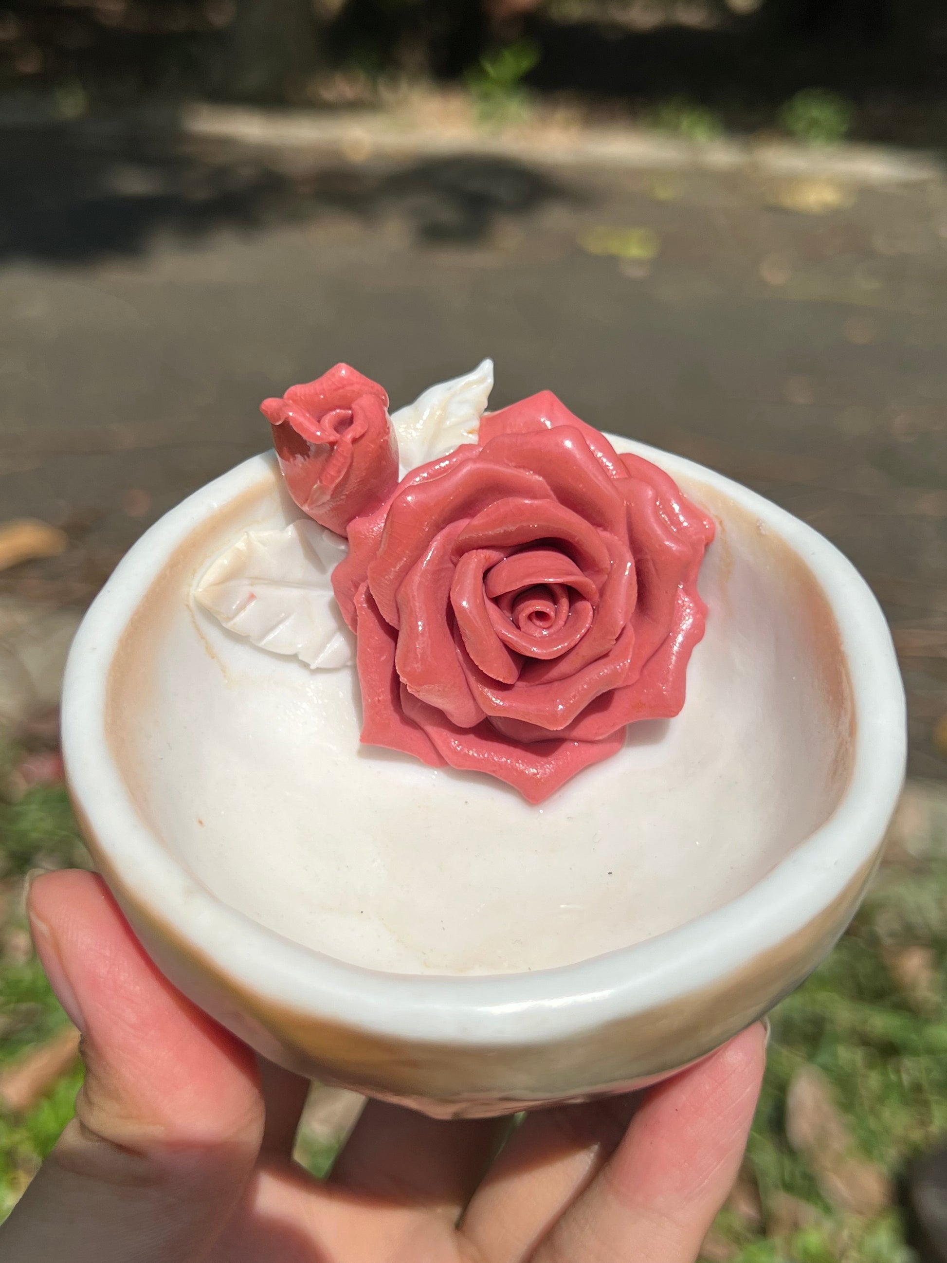 This is a woodfired pottery flower teacup