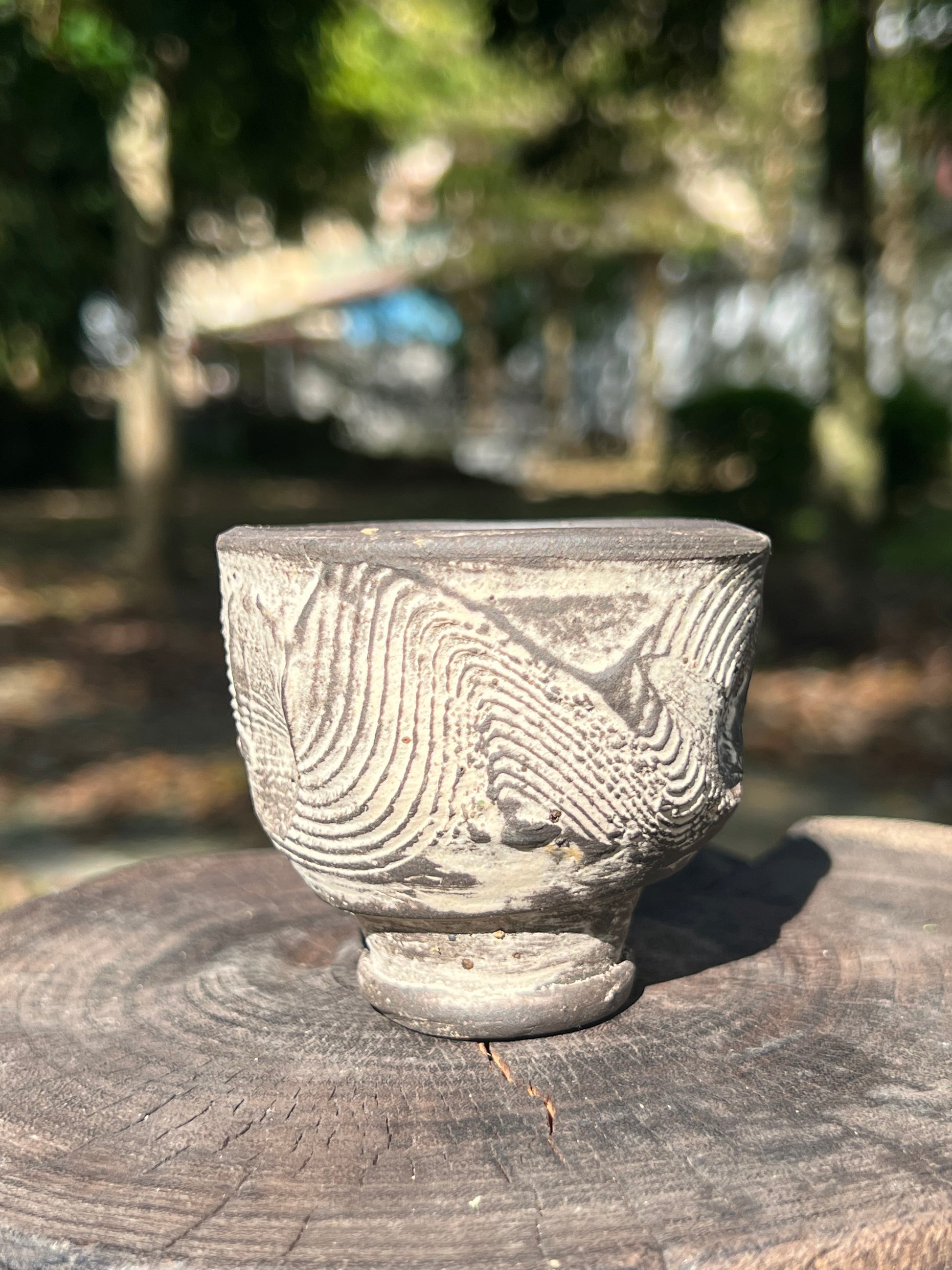 This is a pottery teacup