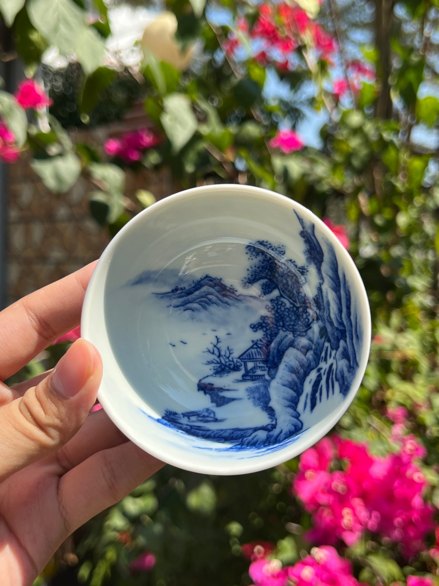 This is a Chinese Jingdezhen blue and white porcelain landscape teacup