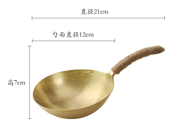 This is a copper tea scoop