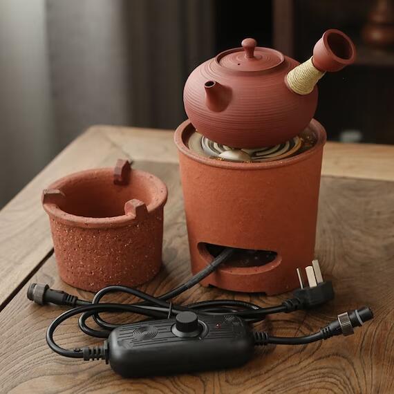 This is a pottery side handle kettle