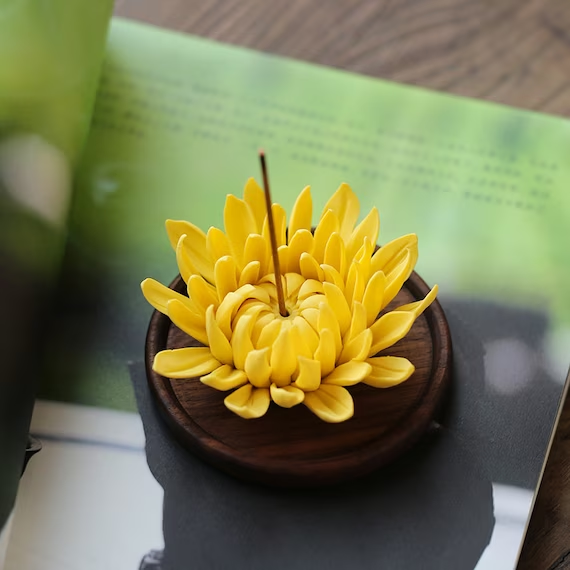 This is a ceramic flower incense holder