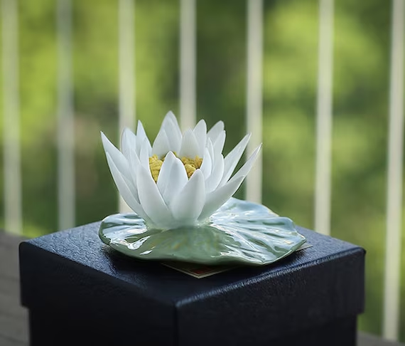 This is a ceramic flower incense holder