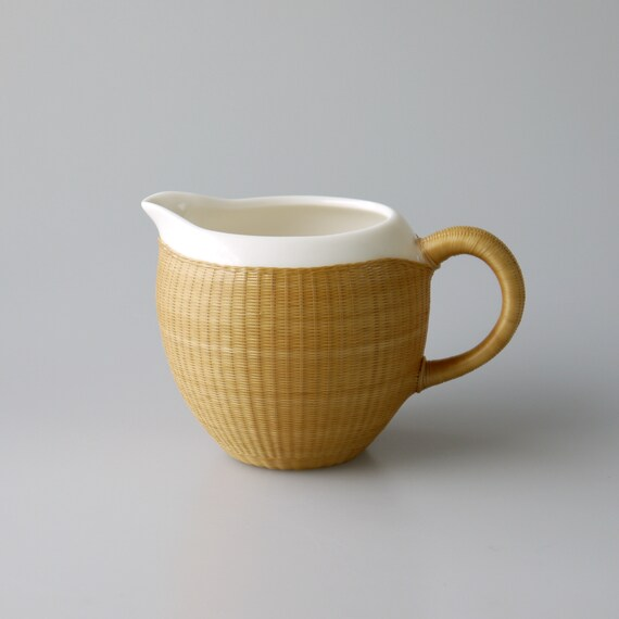 this is a bamboo weaving ceramic gaiwan teapot