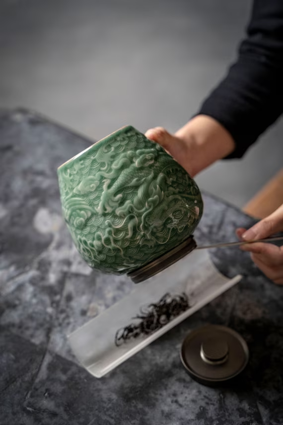 this is a celadon tea jar.this is a green ceramic tea storage canister