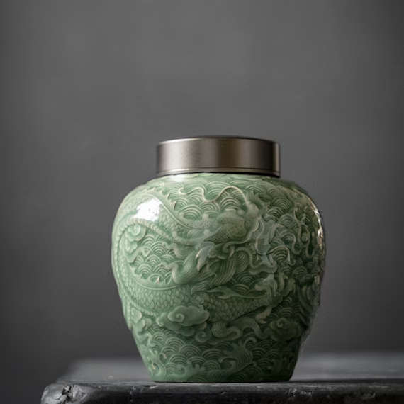 this is a celadon tea jar.this is a green ceramic tea storage canister