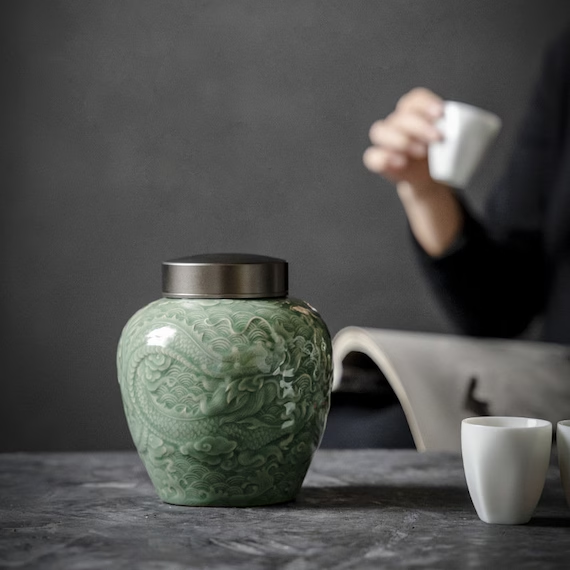 this is a celadon tea jar.this is a green ceramic tea storage canister