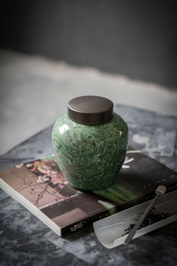 this is a celadon tea jar.this is a green ceramic tea storage canister