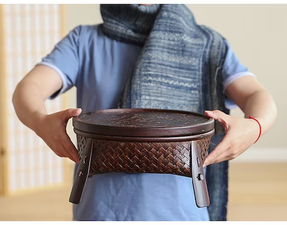 This is a bamboo weaving storage tea table