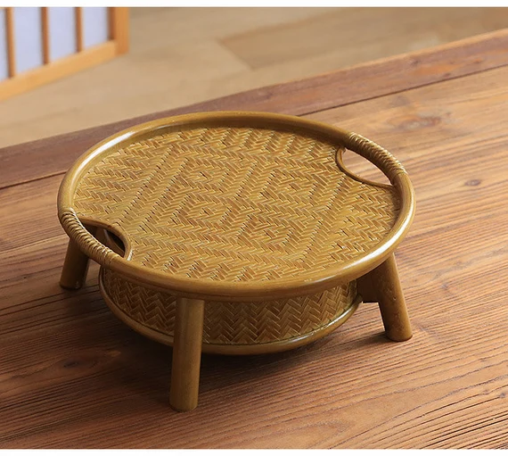 This is a bamboo weaving storage tea table.this is a yellow tea table