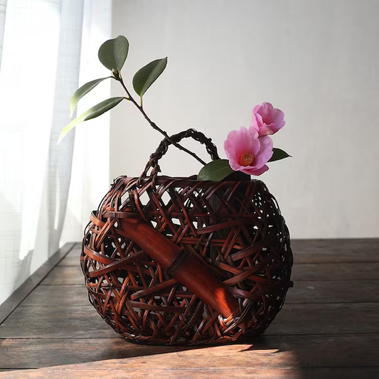 This is a bamboo weaving vase flower arrangement utensil