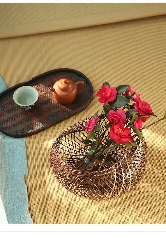 This is a bamboo weaving vase flower arrangement utensil