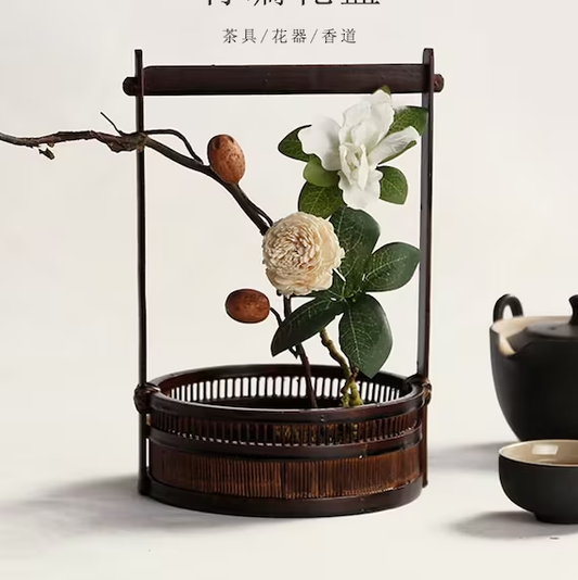 This is a bamboo weaving vase flower utensil