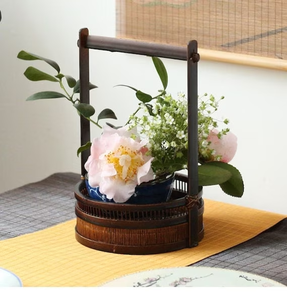 This is a bamboo weaving vase flower utensil