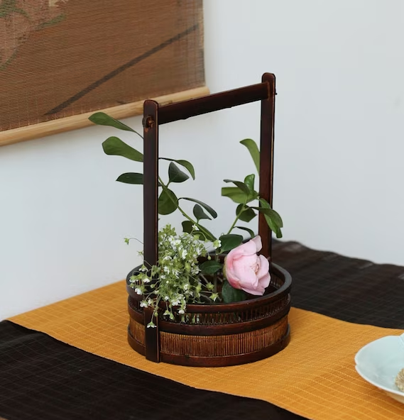 This is a bamboo weaving vase flower utensil