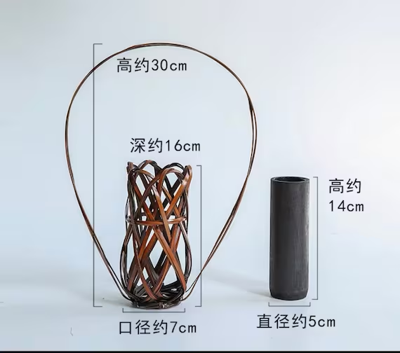 This is a bamboo weaving vase flower utensil